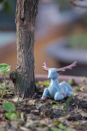 Cute Blue Deer Statue Wallpaper