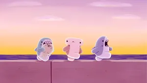 Cute Cartoon Sharks At Sunset Wallpaper
