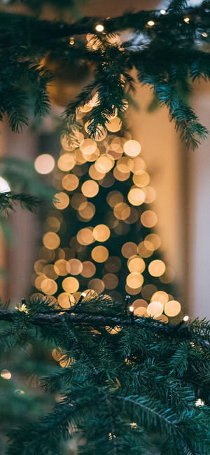 Cute Christmas Iphone Gold Lights Wallpaper