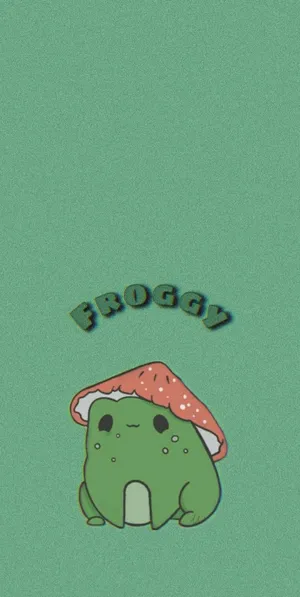 Cute Froggy With Strawberry Hat Wallpaper
