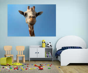 Cute Giraffe Face On Blue Wall Wallpaper