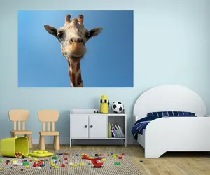 Cute Giraffe Face On Blue Wall Wallpaper