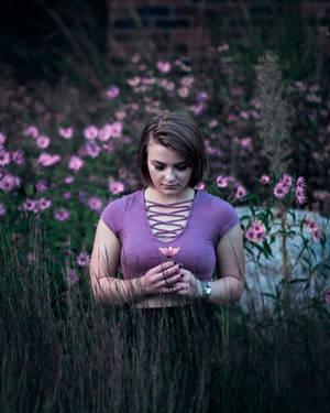 Cute Girl On Pink Flower Field Wallpaper