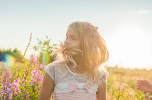 Cute Girl With Pink Flowers Wallpaper