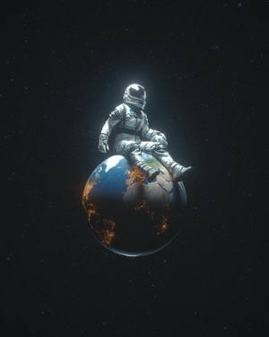 Cute Spaceman Resting On Earth Wallpaper