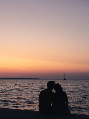 Cute Valentine's Day Sunset Beach Date Wallpaper