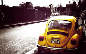 Cute Vintage Yellow Car Wallpaper