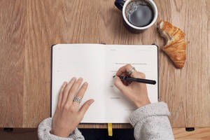 Cute Writing On Wooden Table Wallpaper