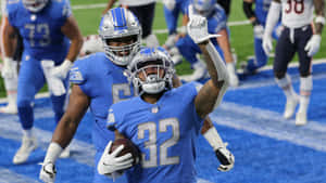 D Andre Swift Celebrating Touchdown Detroit Lions Wallpaper