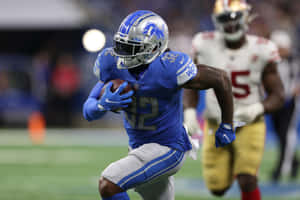 D Andre Swift Detroit Lions Running Action Wallpaper