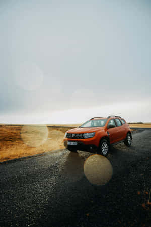 Dacia Duster On Rural Road Wallpaper