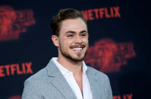 Dacre Montgomery Red Carpet Smile Wallpaper