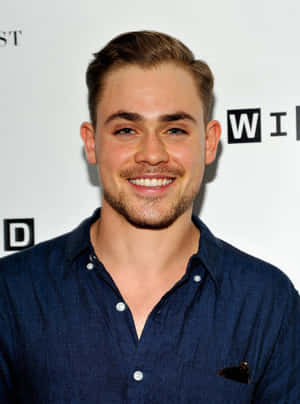 Dacre Montgomery Smiling Event Portrait Wallpaper