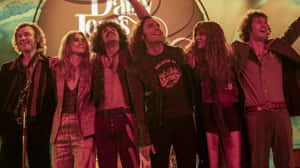 Daisy Jones And The Six Cast On Stage Wallpaper