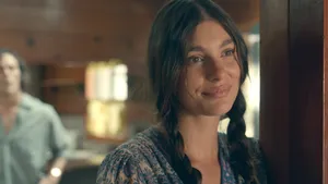 Daisy Jones Smiling Scene Wallpaper