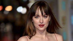 Dakota Johnson Captivating Face Wallpaper