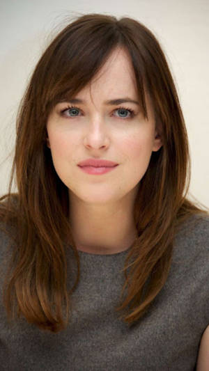 Dakota Johnson Curious Face Wallpaper