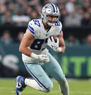 Dallas Cowboys Player Running With Football Wallpaper