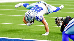 Dalton Schultz Athletic Catch Dallas Cowboys Wallpaper