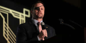 Dan Crenshaw Speakingat Event Wallpaper