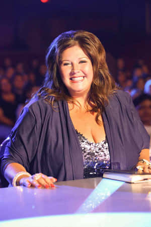 Dance Moms Judge Smilingat Event.jpg Wallpaper