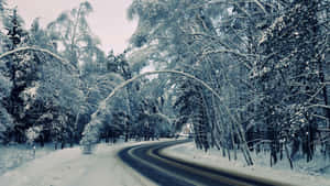 Dangerous Icy Road During Winter Season Wallpaper