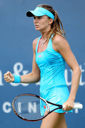 Daniela Hantuchova Aquamarine Outfit Wallpaper