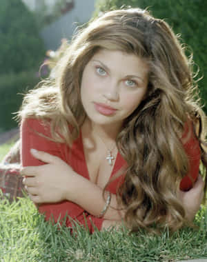 Danielle Fishel, Best Known For Her Role As Topanga In Boy Meets World, Poses In A Stylish Outfit. Wallpaper