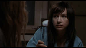 Danielle Harris Posing In A Stylish Photoshoot Wallpaper