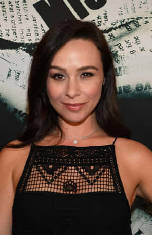 Danielle Harris Posing In An Elegant Outfit Wallpaper