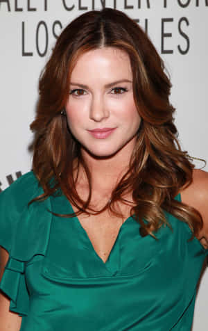 Danneel Ackles Smiling Radiantly Wallpaper