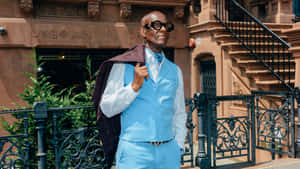 Dapper Dan And His Turquoise Fashion Wallpaper