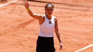 Daria Kasatkina Celebrates Victory On Tennis Court Wallpaper