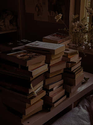 Dark Book Aesthetic Piled Tomes Wallpaper