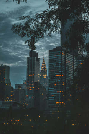 Dark Cityscape Twilight Glow Wallpaper