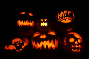 Dark Halloween Pumpkins Pile Wallpaper