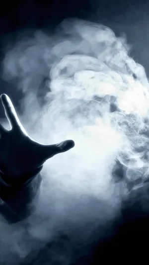Dark Hand Enveloped In Mysterious Aura Wallpaper