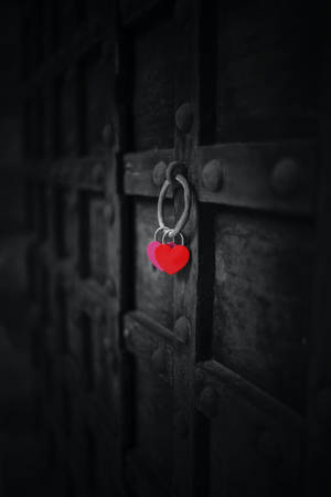 Dark Heart On A Medieval Door Wallpaper