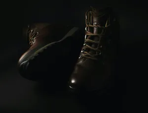 Dark Leather Boots Moody Lighting Wallpaper