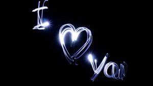 Dark Love Illuminated Heart Wallpaper