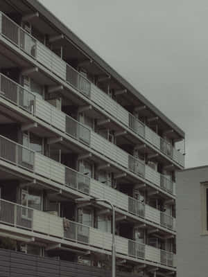 Dark Moody Apartment Building Wallpaper