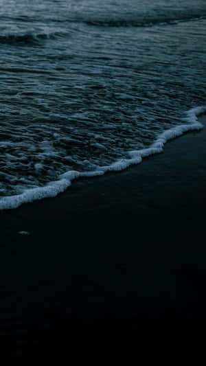 Dark Moody Beach Waves Nighttime Wallpaper