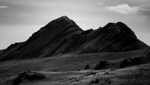 Dark Mountain Under A Majestic Sky Wallpaper