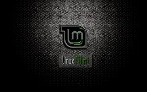 Dark Operating System Linux Mint Logo On Metal Wallpaper