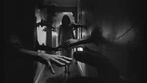 Dark Scary And Creepy Hands On The Hallway Wallpaper