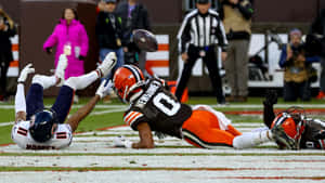 Darnell Mooney In Action Football Game Wallpaper