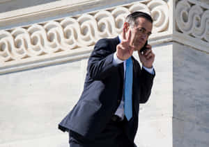 Darrell Issa Flashing A Peace Sign Wallpaper