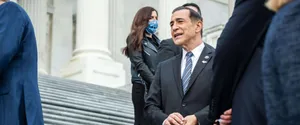 Darrell Issa Posing On The Steps Of The U.s Capitol Building Wallpaper