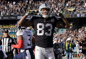 Darren Waller In Action - The Nfl Star Tight End For The Las Vegas Raiders Wallpaper