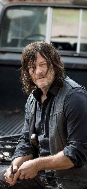 Daryl Dixon Leaningon Truck Wallpaper
